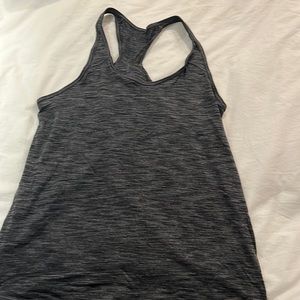 Lululemon Heather black and grey loose fitting tank size 8 runs large loose fit
